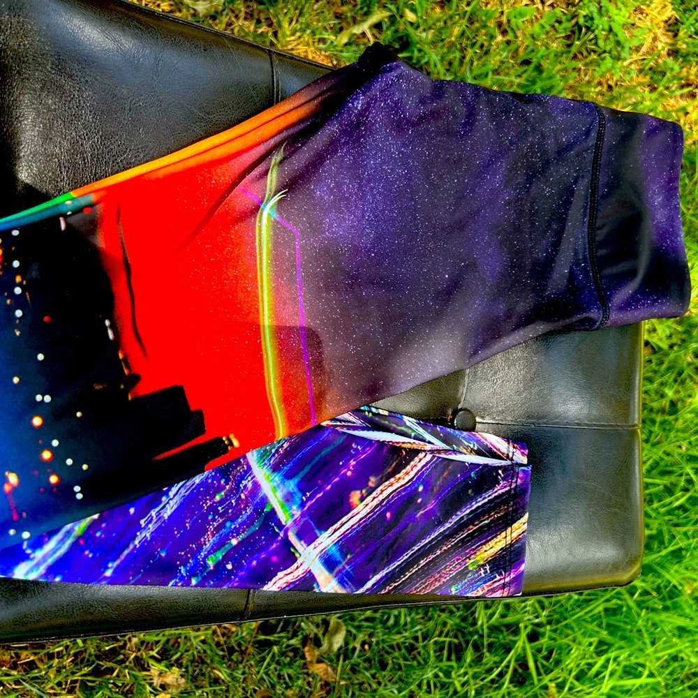 Onzie brand leggings, size xs, stars, and skyline print.